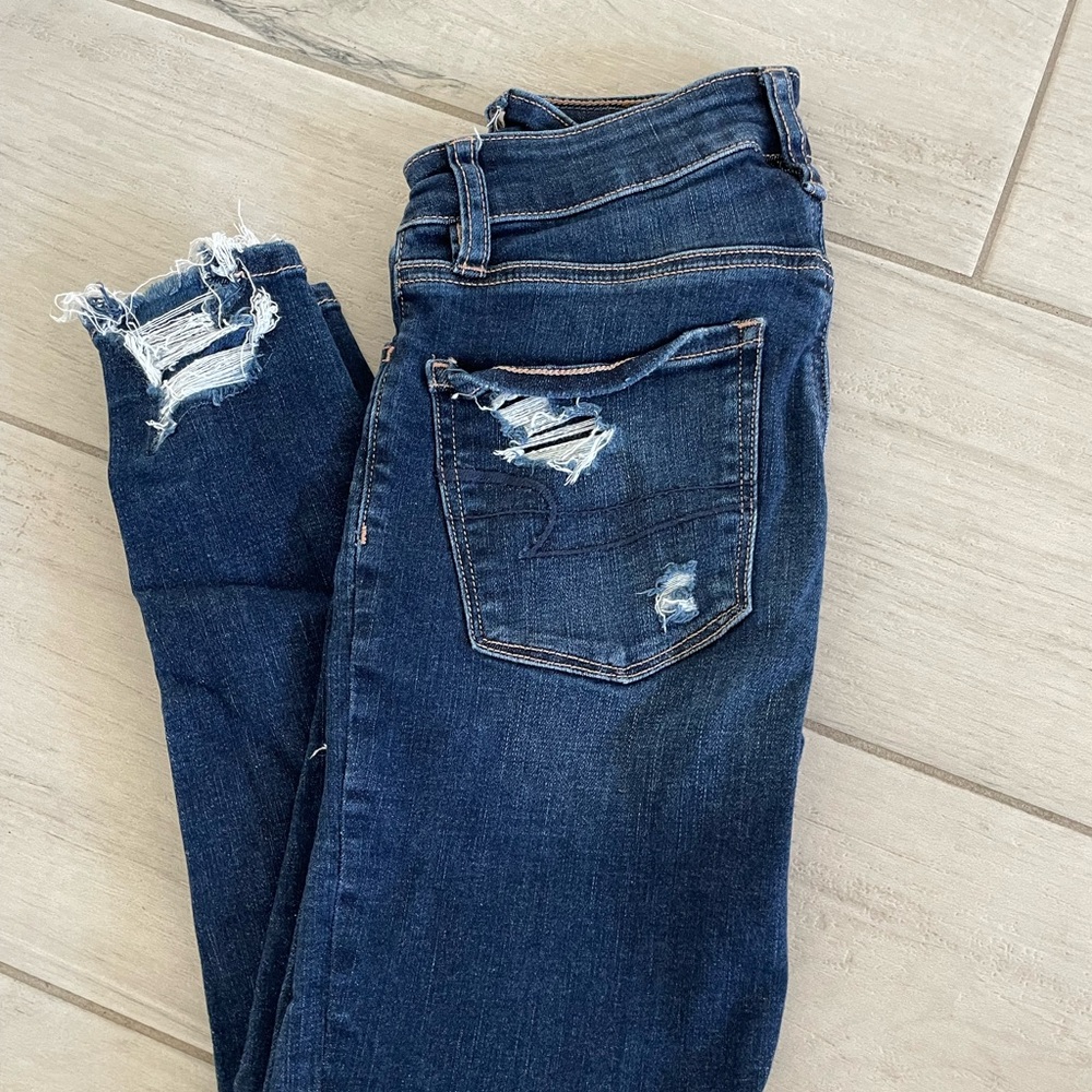 AMERICAN EAGLE JEANS - skinny jeans - distressed ripped jeans - size 00 - 0